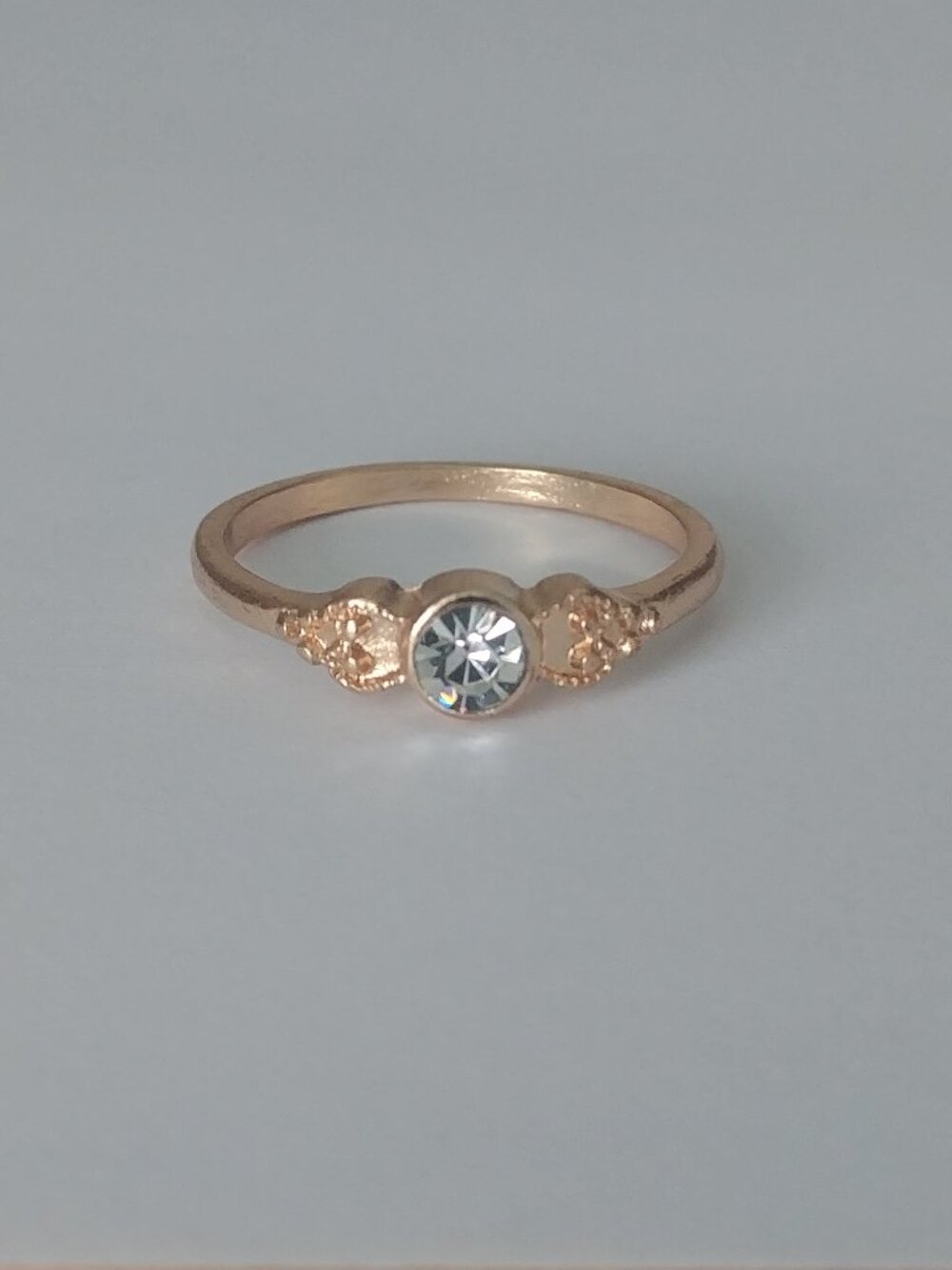 4/$20 Gold tone classic ring with centre imitation diamond crystal